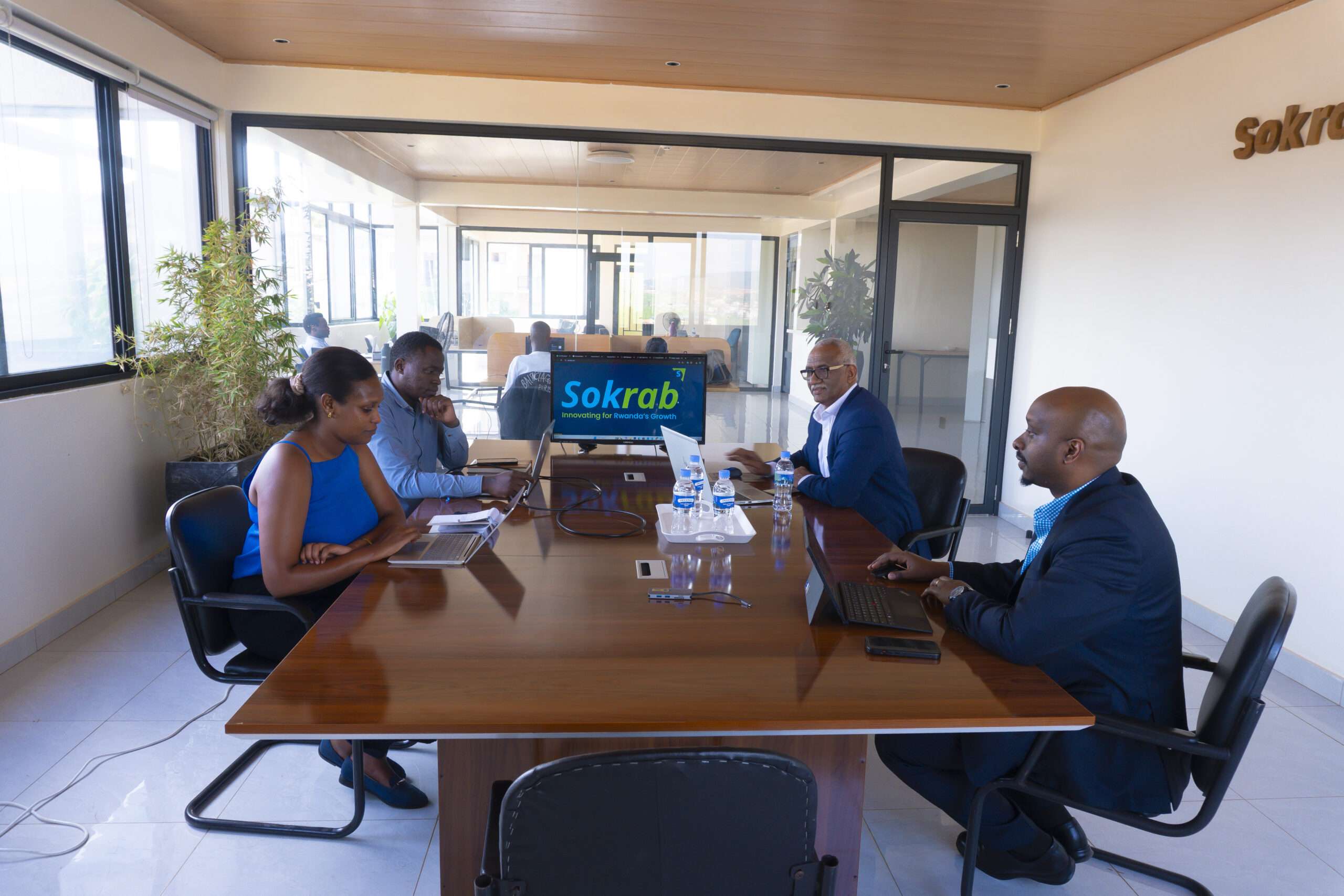 Sokrab Advisory board members discussing TCSP regulatory update Rwanda 2026 in Kigali headquarters.